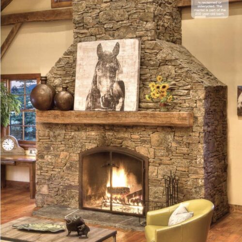 Every element of the fireplace facade is reclaimed or sidecycled. The mantel is part of the 200 year-old barn.